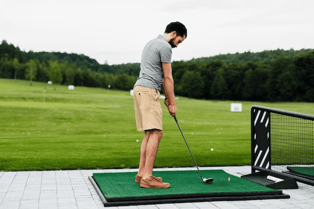 Professional golfer getting ready to hit