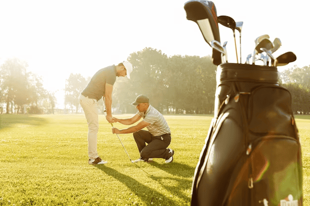 Two men playing golf