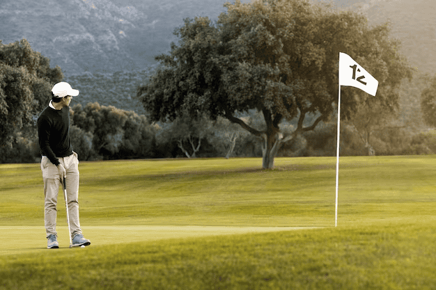 Man playing golf