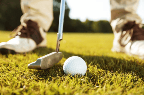 A golf club and a golf ball