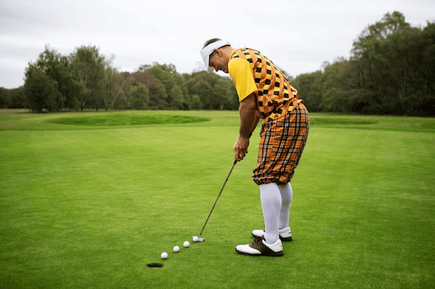 A man playing golf