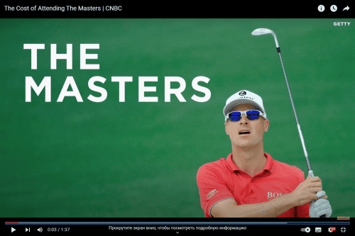 Man with glasses holding a golf club