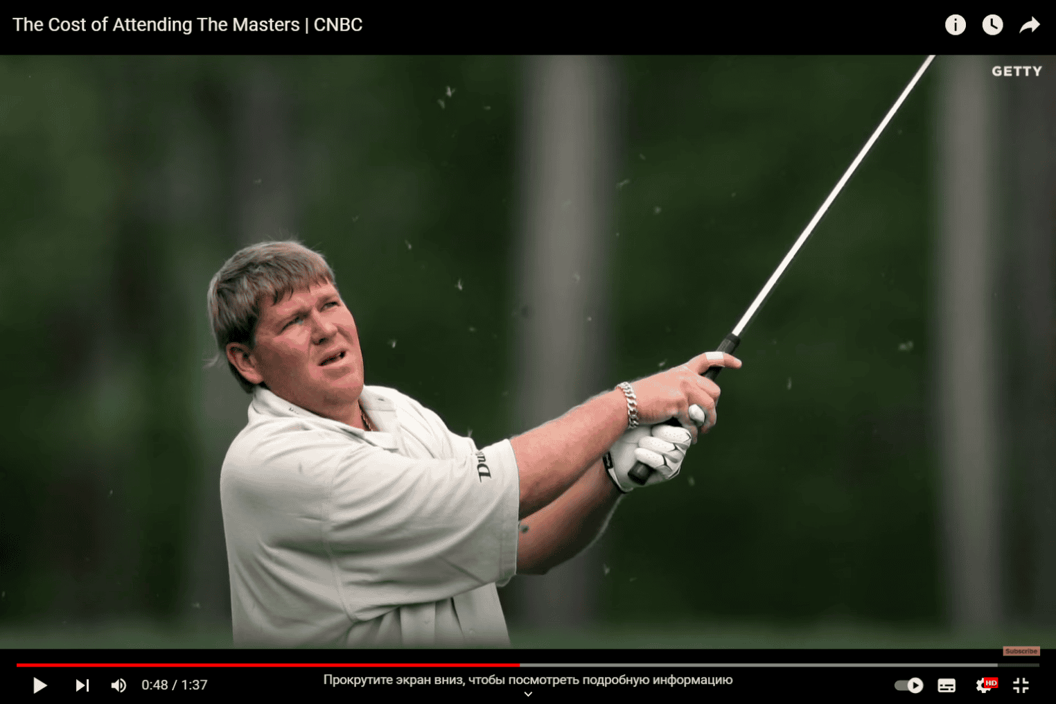 Man hitting the ball with a golf club
